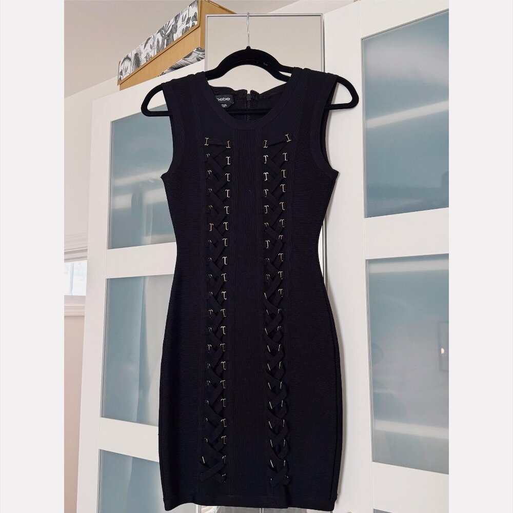 Bebe black bandage mini dress with gold furniture